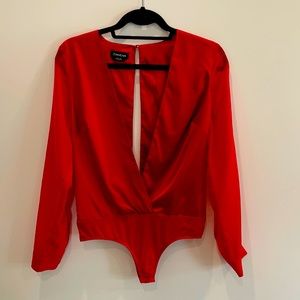 BEBE- satin bodysuit. Size Xs